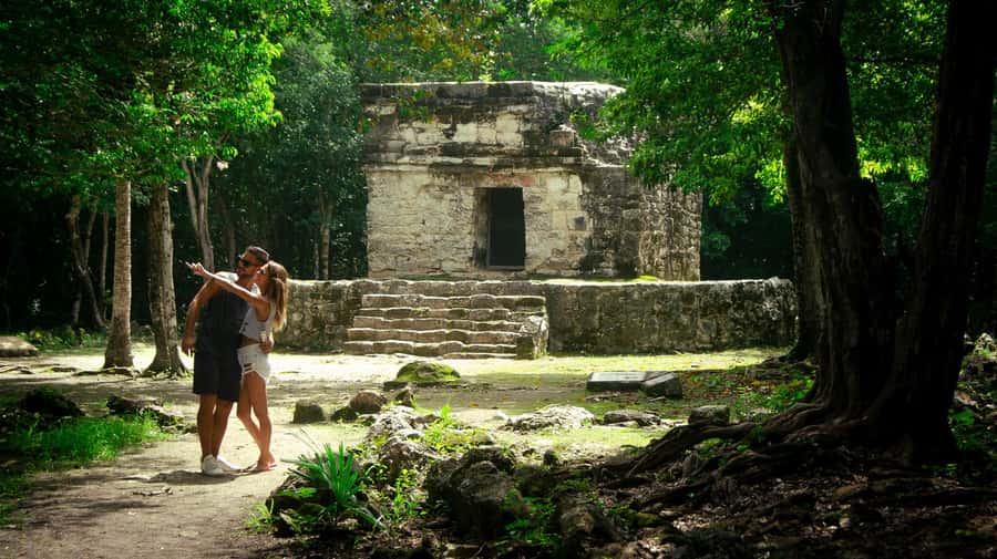 Cozumel: Mayan Ruins Guided Tour with Snorkeling & Lunch - Getting to Playa Uvas: the beach club payoff after the ruins