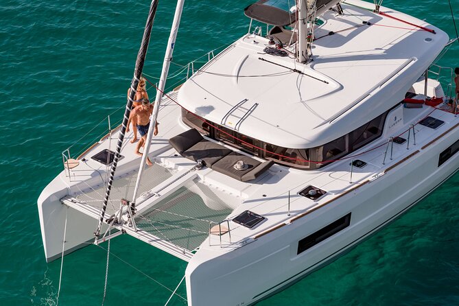 Deluxe Private Boats - 40 ft Catamaran - The day’s first run: Cozumel stops and a snorkel-before-lunch flow