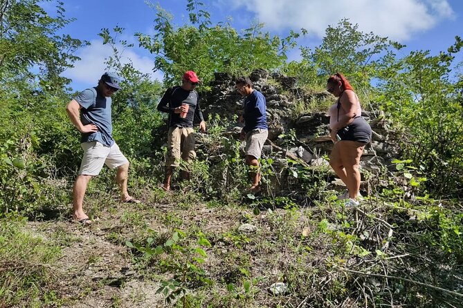 Private Cozumel Cave and Ruin Exploration Tour with Mexican Lunch - El Mirador: artisan huts, the lookout climb, and lunch on the sand