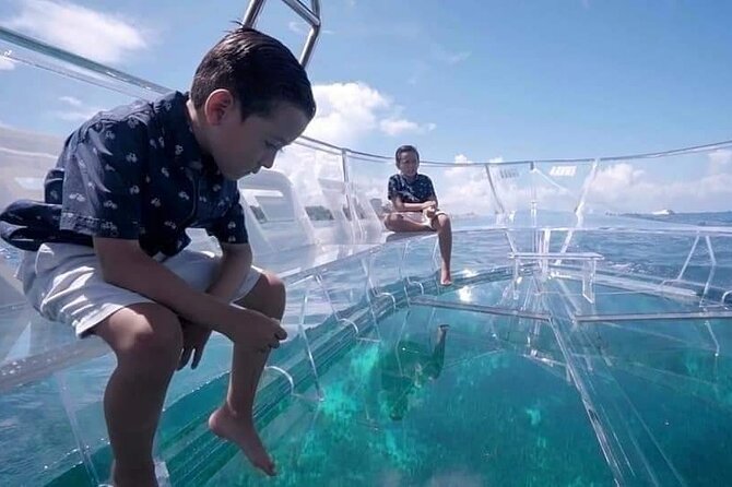 Transparent Boating and Snorkeling Tour in Cozumel All Inclusive - Guides and the vibe on deck and at the office